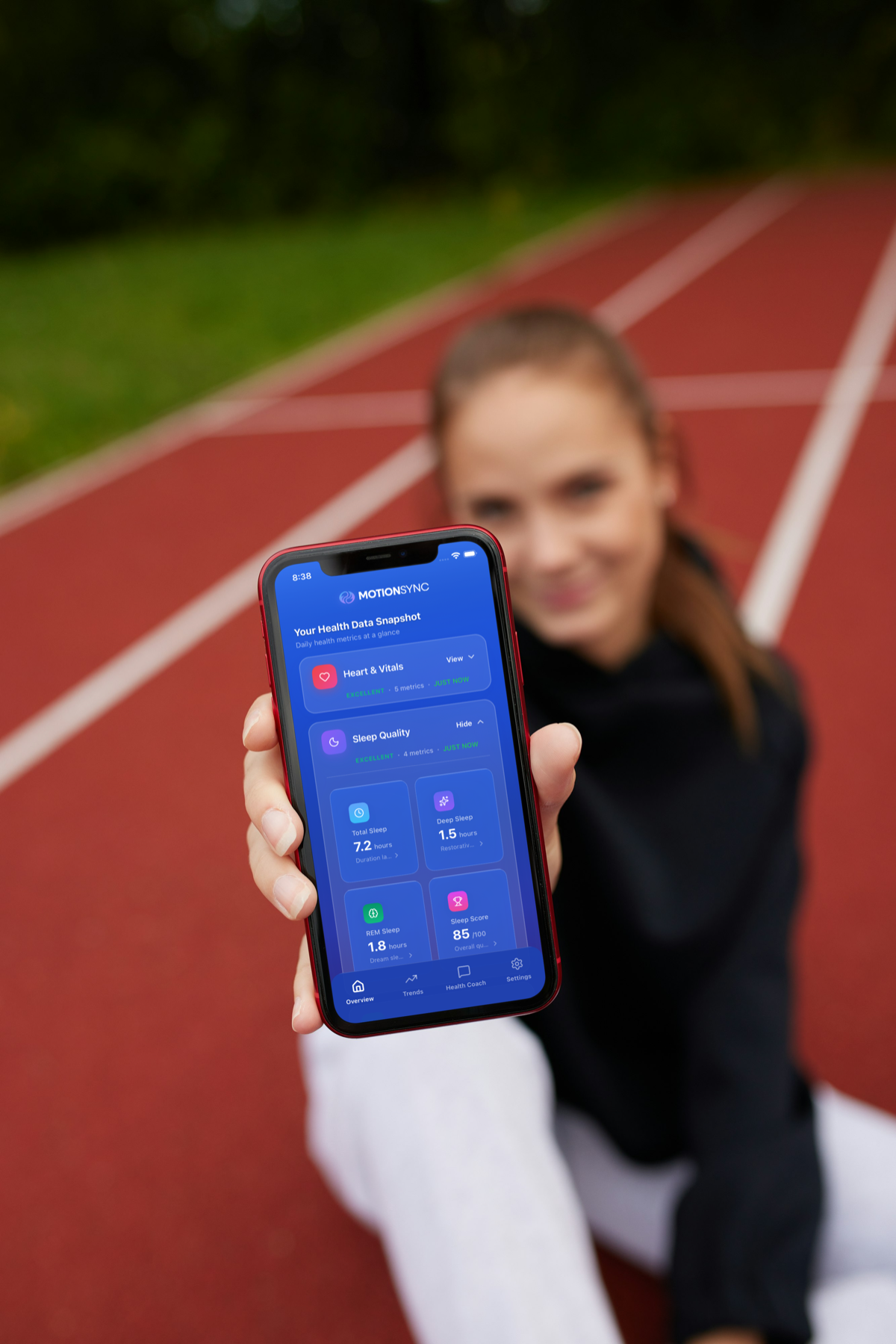 Woman viewing her health dashboard on MotionSync